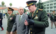 Jefe del Ejército Luis Pozzi, Arturo Puricelli (Defensa) y Gral. Milani (der.)