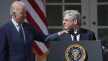 Joe Biden y Merrick Garland
